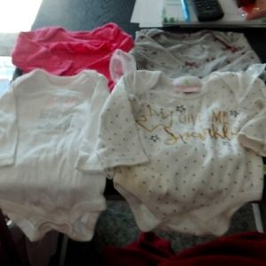 4 long sleeve onepiece outfit for 0-3mos. Gently worn-near new.